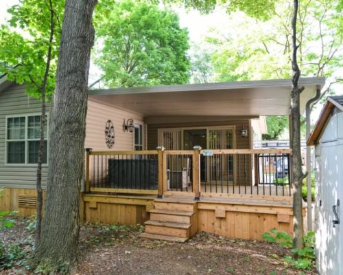 solid-insulated-patio-cover-roof-white-wood-floor-grey-bruce-patio